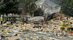 Firefighters from Bel Air and other departments work the scene of a house explosion in Bel Air that left two, including a utility contractor, dead.