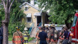 Syracuse firefighters at the scene of one of four house fires. Syracuse firefighters at the scene of one of four house fires.
