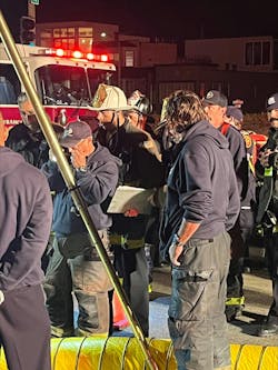The incident commander holds a safety checklist. The incident commander holds a safety checklist.