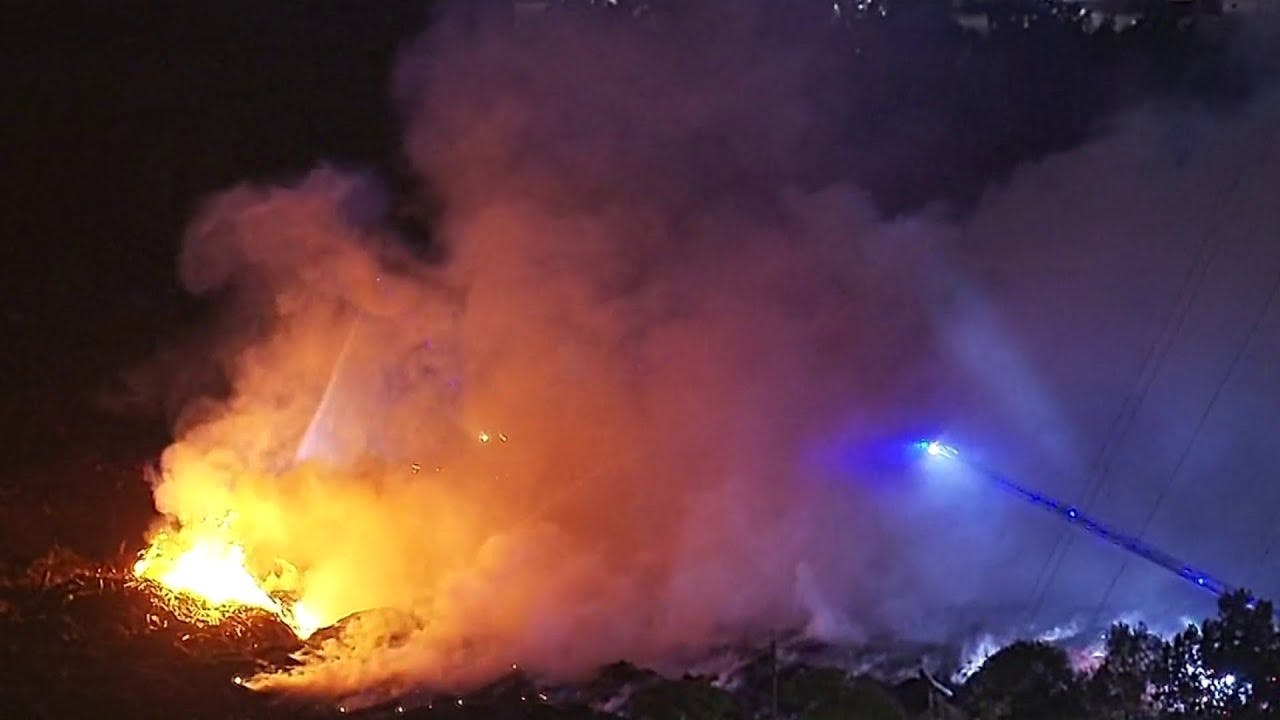 Detroit fire crews battle massive mulch fire