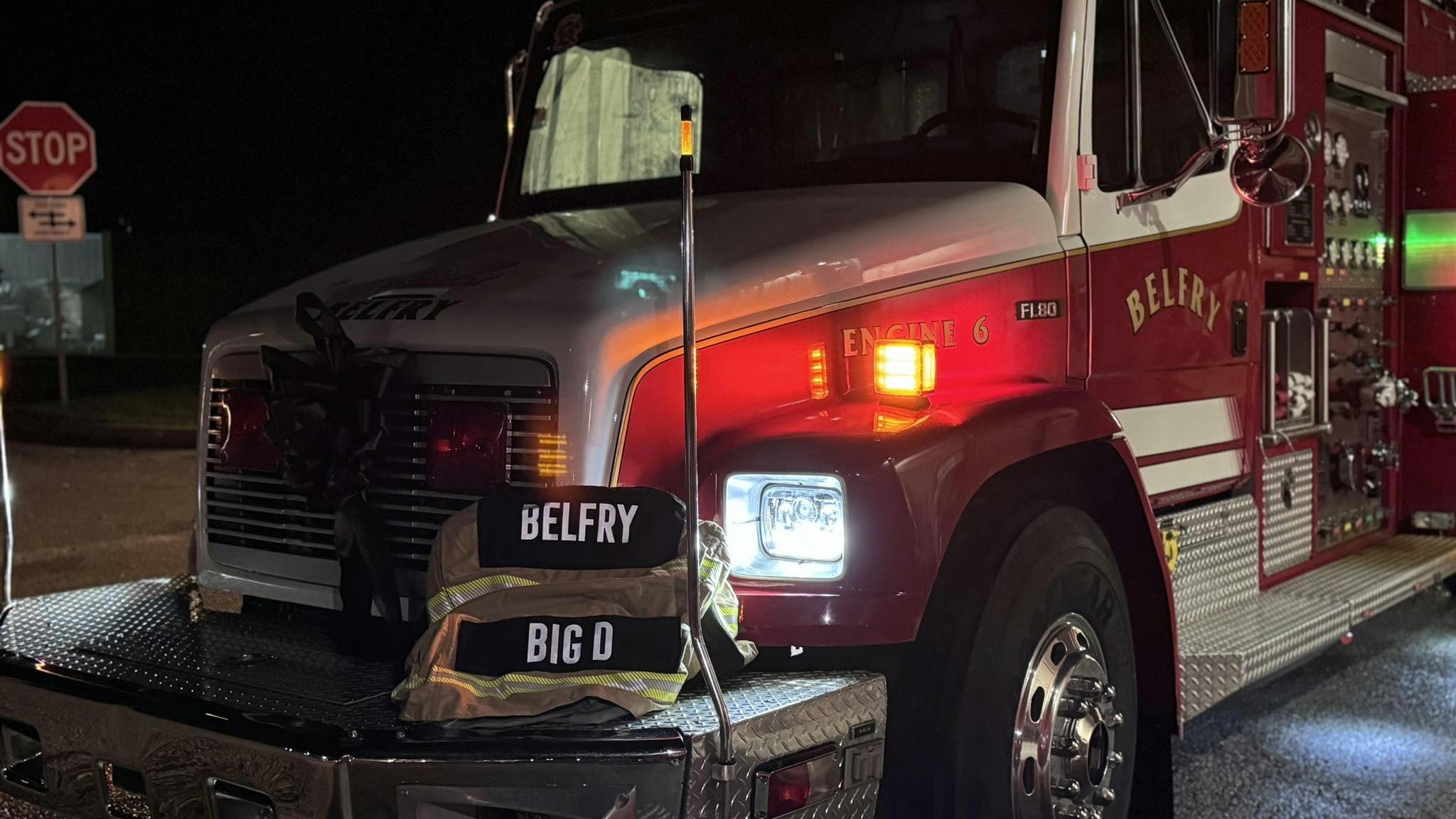 A memorial has been set up for Darrell Helton on a Belfry fire apparatus after he suffered a possible heart attack during a fire Wednesday night.