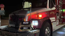 A memorial has been set up for Darrell Helton on a Belfry fire apparatus after he suffered a possible heart attack during a fire Wednesday night.