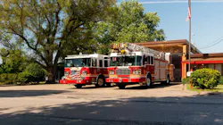Two firefighters from Indianapolis were struck by a car, with one going airborne and the second being pinned by the car Saturday morning.