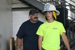 Huntington, WV, Deputy Chief Brian Grieco with camper Kenton Haddix from the Beverly, WV, Volunteer Fire Department, who was named the 2024 Junior Camp Chief. Huntington, WV, Deputy Chief Brian Grieco with camper Kenton Haddix from the Beverly, WV, Volunteer Fire Department, who was named the 2024 Junior Camp Chief.