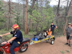 North Fork Volunteer Fire Department (NFVFD) has two two-wheel-drive, low-speed/high-torque, off-road motorcycles to navigate single-track trails for rescues that are far from a road. Here, an injured dog is rescued off of the Colorado Trail. North Fork Volunteer Fire Department (NFVFD) has two two-wheel-drive, low-speed/high-torque, off-road motorcycles to navigate single-track trails for rescues that are far from a road. Here, an injured dog is rescued off of the Colorado Trail.