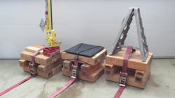 Photo 1: Secured crib stacks with tools 12 inches high. Photo 1: Secured crib stacks with tools 12 inches high.