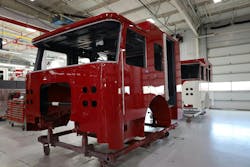 These cabs have been painted and are awaiting the next stages of the production process. These cabs have been painted and are awaiting the next stages of the production process.