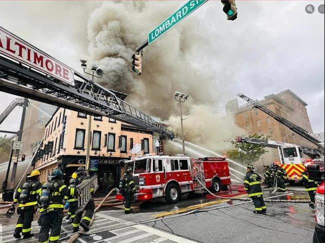 Baltimore firefighters battled a six-alarm fire Sunday morning.