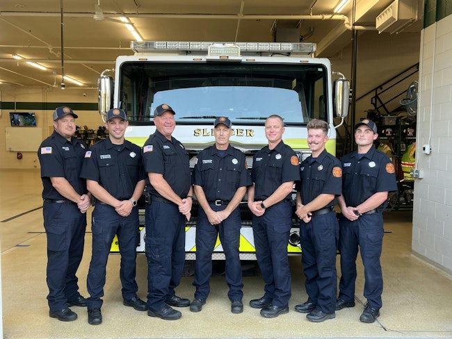 Jeff Westphal (center) is flanked by fellow members of the Slinger, WI, Fire Department.