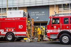 Los Angeles County firefighters wrap up an operation. Los Angeles County firefighters wrap up an operation.