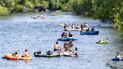 People float in the Boise River. People float in the Boise River.