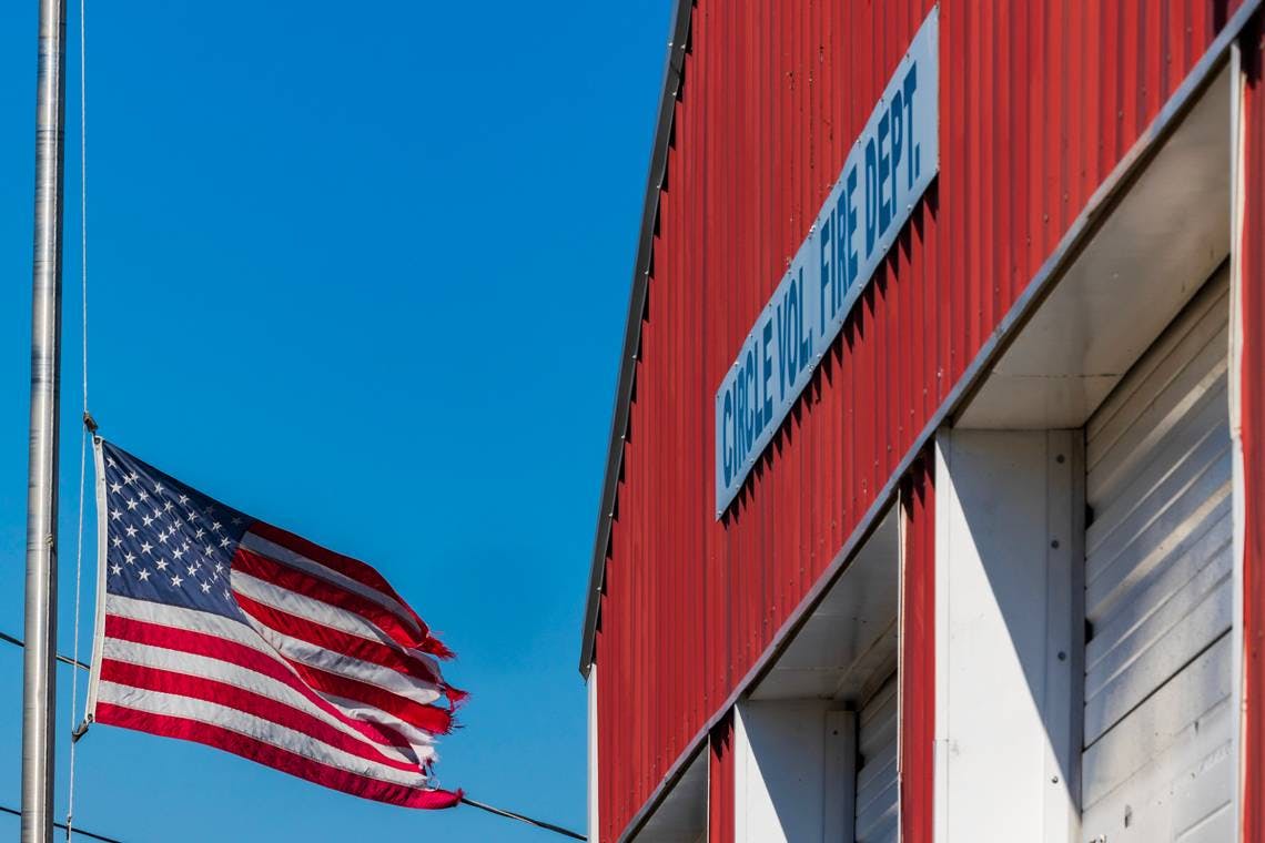 The flag at the Circle Volunteer Fire Department flies at half-staff in honor of its fallen.