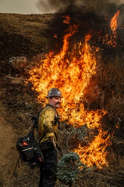 A member of the Harrison Canyon handcrew from the San Bernardino County, CA, Fire Department conducts a firing operation during the Line Fire. A member of the Harrison Canyon handcrew from the San Bernardino County, CA, Fire Department conducts a firing operation during the Line Fire.