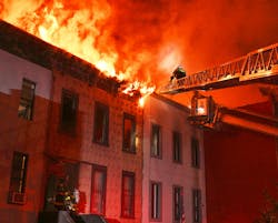 Fifty units and at least 130 members of FDNY battled a four-alarm fire that originated in a three-story apartment building and spread to the apartment buildings that were on each side of the building of origin, ultimately heavily damaging five buildings in total. Fifty units and at least 130 members of FDNY battled a four-alarm fire that originated in a three-story apartment building and spread to the apartment buildings that were on each side of the building of origin, ultimately heavily damaging five buildings in total.