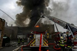 Scranton Fire Department (SFD) firefighters arrived to thick black smoke that was pushing from an old meat packing warehouse. Scranton Fire Department (SFD) firefighters arrived to thick black smoke that was pushing from an old meat packing warehouse.