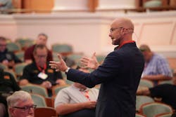 Claycomb discusses AI integration with the audience at the FireFusion Conference 2024 Claycomb discusses AI integration with the audience at the FireFusion Conference 2024