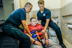 The Binder Lift from PHASE International equips firefighters to safely respond to these calls by attaching as many as 32 handles to the patient’s torso. The Binder Lift from PHASE International equips firefighters to safely respond to these calls by attaching as many as 32 handles to the patient’s torso.