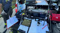 This command post, which was for a four-alarm wildland urban interface fire that involved numerous neighborhoods and damaged nearly two dozen houses, includes a mobile radio, portable radios, numerous cellphones with chargers, and a computer and an iPad with cellular service. The incident involved more than a half-dozen entities and was managed under the Unified Command model. Numerous company officers were assigned to the command post to help to facilitate communications through the use of five channels, numerous cellphones and a computer with CAD to allow the tracking of resources. One channel was assigned strictly for the command staff to communicate nonemergency information regarding coverage, logistics and future potential needs.