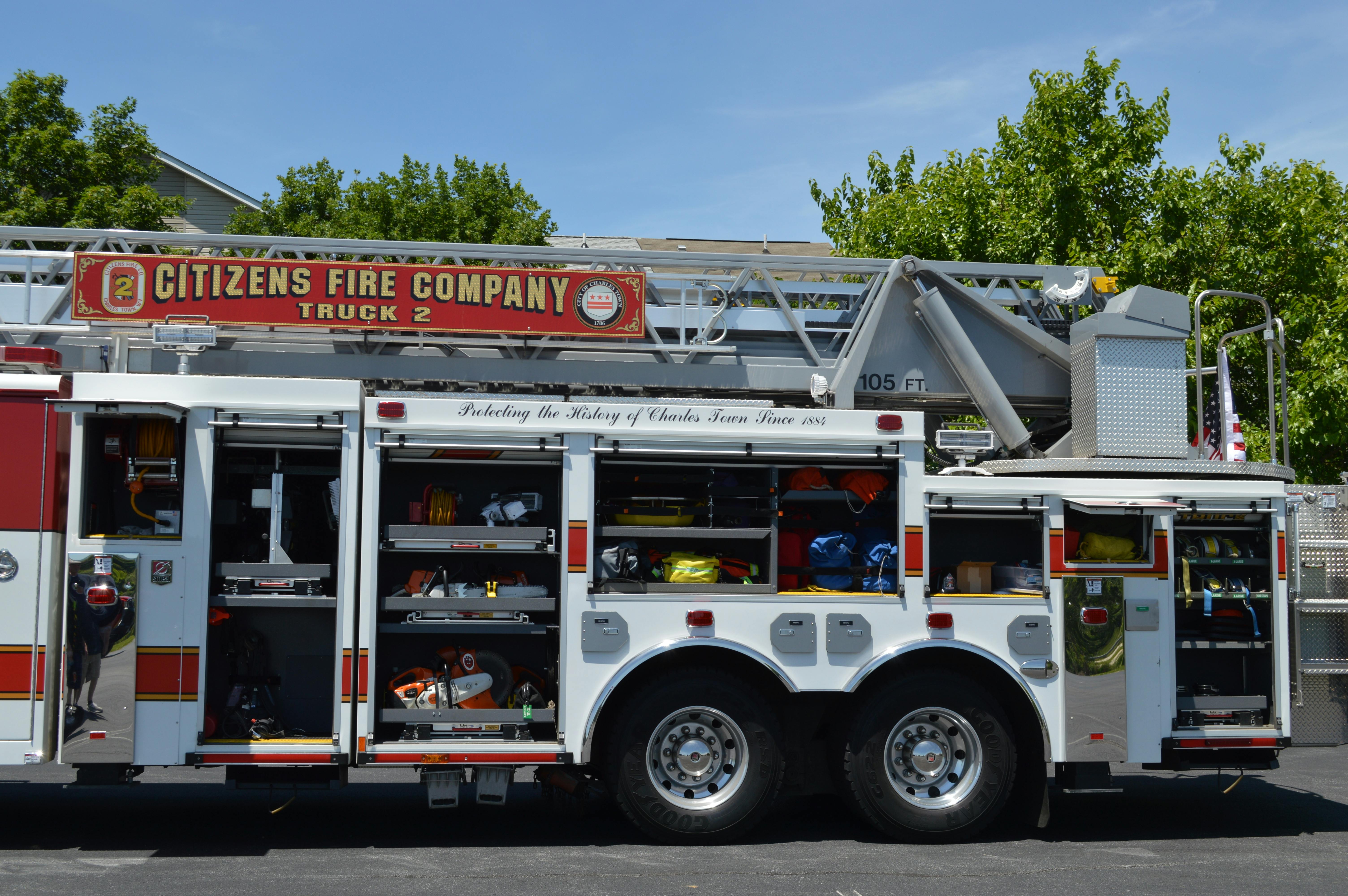 The Citizens Fire Company in Charlestown, WV, operates this well-equipped 2017 Spartan Smeal 105-foot, rear-mount aerial ladder that carries 202 feet of ground ladders on a 238-inch wheelbase. Note the floor mounted and adjustable slide trays that provide space for saws, portable lighting and forcible entry tools.