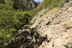 Glenwood Canyon Manager Colleen Pennington hikes the trail to Hanging Lake in May 2022, near Glenwood Springs, CO. Hanging Lake survived the Grizzly Creek fire that burned 33,000 acres in 2020, but the damage triggered a series of floods that led to closures off and on in the years since. Glenwood Canyon Manager Colleen Pennington hikes the trail to Hanging Lake in May 2022, near Glenwood Springs, CO. Hanging Lake survived the Grizzly Creek fire that burned 33,000 acres in 2020, but the damage triggered a series of floods that led to closures off and on in the years since.