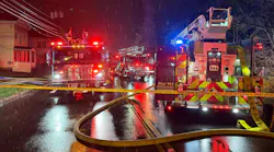 The scene outside the Syracuse house fire Saturday night where firefighters rescued a victim.
