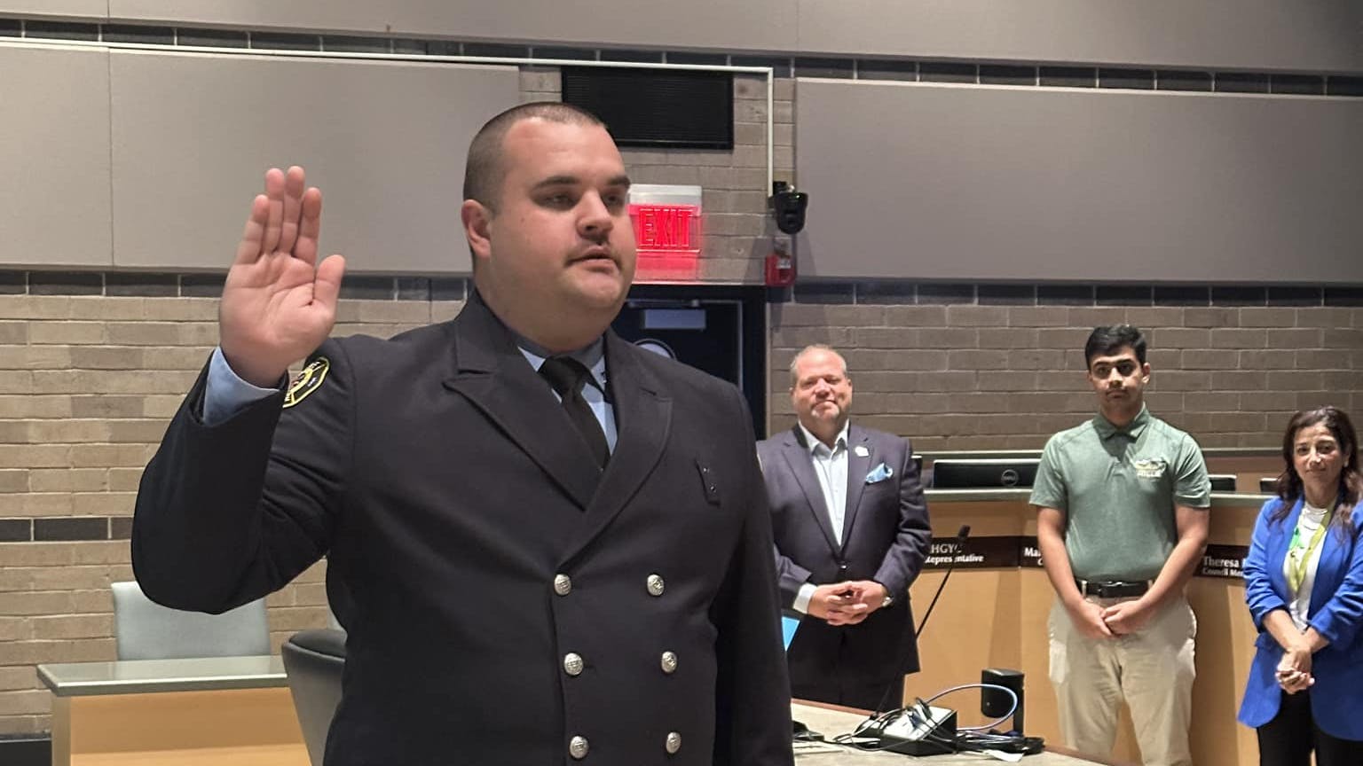 Rochester Hills Lt. Chris Ogg saw smoke coming from the house when he grabbed a ladder and rescued two people from the second floor of the home before firefighters arrived.