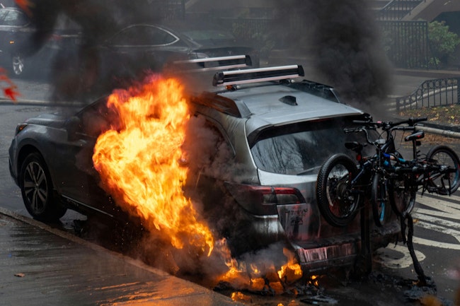 The Subaru SUV caught fire after an underground electrical fire in Brooklyn Thursday.