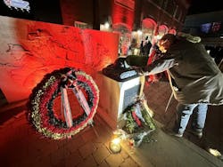 A retired firefighter touches the memorial for the Worcester Cold Storage Fire after the 25th anniversary memorial service. A retired firefighter touches the memorial for the Worcester Cold Storage Fire after the 25th anniversary memorial service.