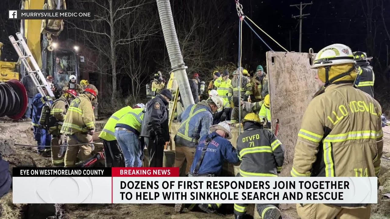 Dozens of first responders join together to help with sinkhole search