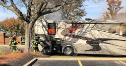 Early in the response to a motor home fire, the crew of Mason, OH, Fire Department Tower 52 applied water to the engine compartment at the rear of the vehicle. There wasn’t much change in the smoke condition at that location as a result, so a rear window was taken out for ventilation. Early in the response to a motor home fire, the crew of Mason, OH, Fire Department Tower 52 applied water to the engine compartment at the rear of the vehicle. There wasn’t much change in the smoke condition at that location as a result, so a rear window was taken out for ventilation.