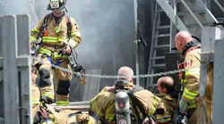 Hillsborough firefighters retreat from the roof as they battled a multiple-alarm structure fire in a restaurant in June.