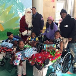 In Madison, WI, Santa delivers gifts to those in the American Family Children's Hospital. In Madison, WI, Santa delivers gifts to those in the American Family Children's Hospital.