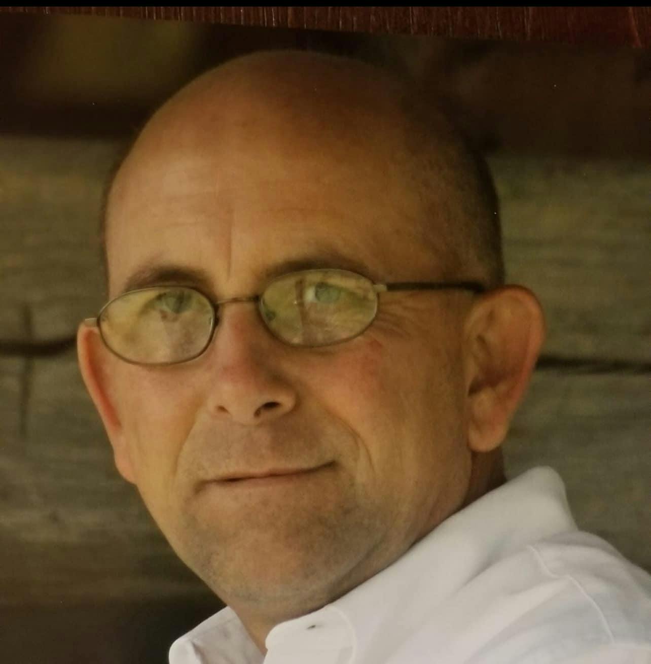 Henderson County Fire Chief Lynn Murphy was found in cardiac arrest after responding to a call.