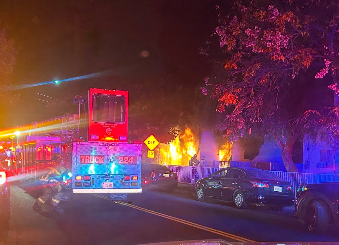Units arrived within minutes to find heavy fire showing from the first floor of a two-story apartment building.