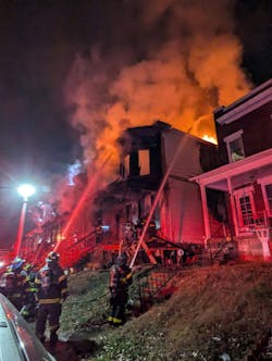 Baltimore firefighters battled a fatal row house fire Friday morning. Baltimore firefighters battled a fatal row house fire Friday morning.