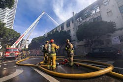 Los Angeles firefighters work the scene of a greater alarm fire at the vacant Morrison Hotel, made famous by a photo shoot for the Doors band. Los Angeles firefighters work the scene of a greater alarm fire at the vacant Morrison Hotel, made famous by a photo shoot for the Doors band.