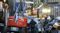 Law enforcement officers investigate a mass shooting in New Orleans that left 10 dead and 35 hurt.