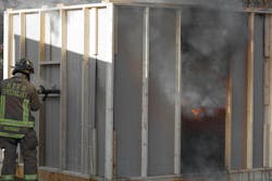 A Bresnan nozzle is applied horizontally within a compartment to extinguish the fire. A Bresnan nozzle is applied horizontally within a compartment to extinguish the fire.