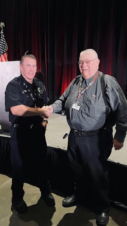 Bill Foster with an attendee of Spartan's Fire Truck Training Conference. Bill Foster with an attendee of Spartan's Fire Truck Training Conference.