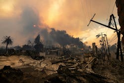 At least 10 people have died and 9,000 structures have been destroyed by the multiple wildfires fanned by powerful winds. At least 10 people have died and 9,000 structures have been destroyed by the multiple wildfires fanned by powerful winds.