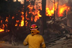 Private firefighters have been contracted by a number of homeowners and insurance companies to protect their properties as wildfires rage in California. Private firefighters have been contracted by a number of homeowners and insurance companies to protect their properties as wildfires rage in California.