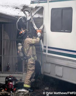Lt. J.W. Lanham uses extrication tools to gain access to the patient, and to shut off the accelerator. Lt. J.W. Lanham uses extrication tools to gain access to the patient, and to shut off the accelerator.