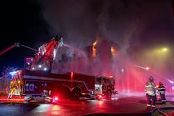 The Rochester Fire Department received multiple calls that reported a building on fire. First-arriving companies found heavy fire showing from numerous windows on the first floor and out the front door of a four-story vacant mill. The Rochester Fire Department received multiple calls that reported a building on fire. First-arriving companies found heavy fire showing from numerous windows on the first floor and out the front door of a four-story vacant mill.