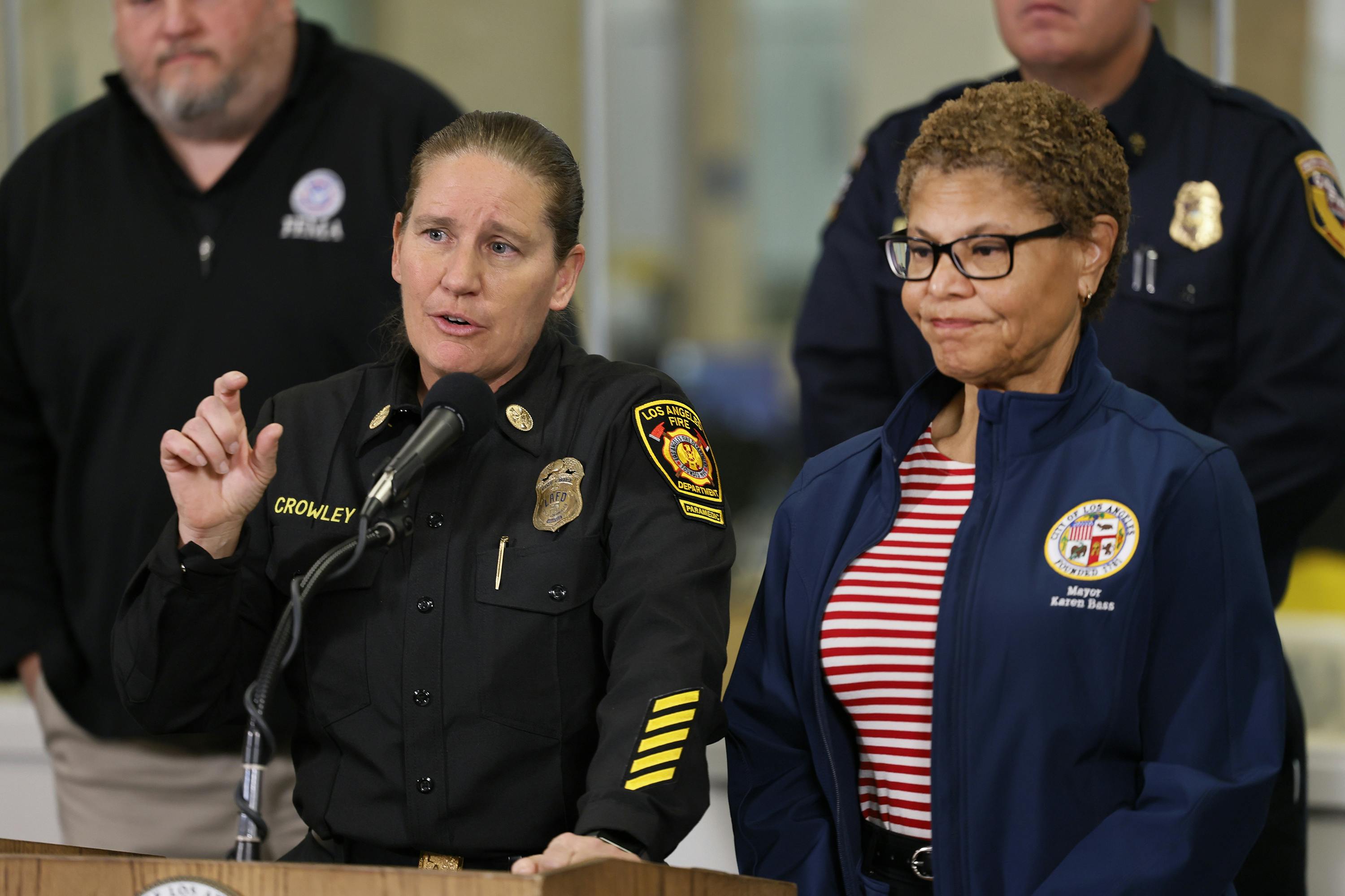 Los Angeles Fire Chief Kristin Crowley, left, and Los Angeles Mayor Karen Bass address the media at a news conference.