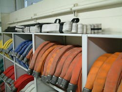 Maximizing hose storage capacity was a goal of the design of the new firehouse for the Fort Atkinson, WI, Fire Department. Spacesaver custom-manufactured a shelving solution that delivered on that need as well as increasing the ease by which members access hose. Maximizing hose storage capacity was a goal of the design of the new firehouse for the Fort Atkinson, WI, Fire Department. Spacesaver custom-manufactured a shelving solution that delivered on that need as well as increasing the ease by which members access hose.