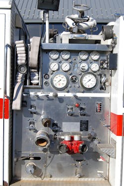 Pump panels from earlier rigs, such as the one on this 1977 Mack CF rig, generally were more compact, with all discharges controlled via direct-acting linkages and pull rods. In later years, NFPA 1901: Standard for Automotive Fire Apparatus was changed to require that a gauge be located adjacent to the respective discharge control. Note the vernier throttle on the lower panel and the discharge relief valve in the upper right panel. Pump panels from earlier rigs, such as the one on this 1977 Mack CF rig, generally were more compact, with all discharges controlled via direct-acting linkages and pull rods. In later years, NFPA 1901: Standard for Automotive Fire Apparatus was changed to require that a gauge be located adjacent to the respective discharge control. Note the vernier throttle on the lower panel and the discharge relief valve in the upper right panel.