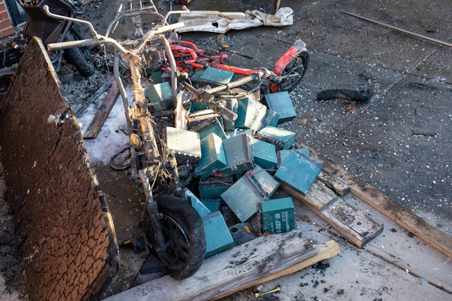 A firefighter and three residents were injured in a fire caused by e-bike batteries