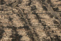 An aerial view of the destruction in Palisades, CA. An aerial view of the destruction in Palisades, CA.