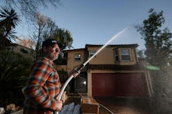 David Whitman, who has seen an uptick in hydrant sales, demonstrates a system at his South Pasadena house. David Whitman, who has seen an uptick in hydrant sales, demonstrates a system at his South Pasadena house.