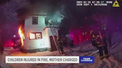 Bodycam video shows firefighters pulling a 12 year-old girl from a burning home